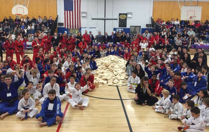 Provide photos With more than 300 children and adults in attendance, United Martial Arts Centers generated $21,578 for Save the Children at the 2017 Break a Thon Tournament by breaking more than 4,000 boards.
