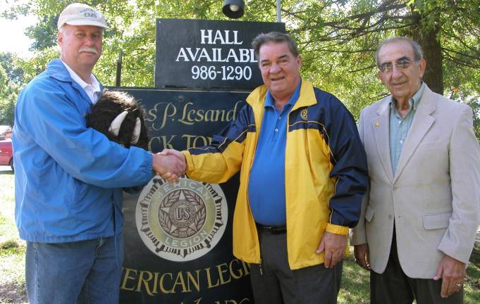 Photo by Sean Ryan John Woloszczak Jr., left, has been selected Warwick&#xed;s 2012-13 Citizen of the Year. He will be honored during an Oct. 20 banquet at Pine Island&#xed;s Polish Legion of American Veterans Hall. Co-chairs for the event are Warwick Rotarians Stan Martin, center, and Leo Kaytes.