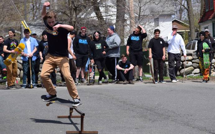 Spencer Griffler grinds on the rails in the 11-17 Skateboard Competition at the Do It For Dale Skate Contest.