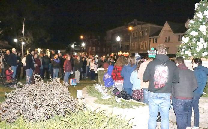 On Friday evening, Nov. 23, a large crowd of local residents gathered on the Green to witness the annual lighting event.