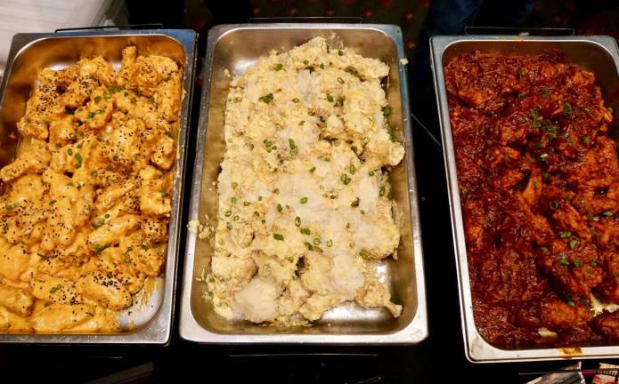 Provided photos The good folks at the Sweet Onion Brewhouse in the Village of Florida entered the three types of wings in last weekend's Wing Wars, a competition put on by radio station WPDH. The wings, from left to right, are Bang Bang (the grand prize winner), Chicken Pot Pie and BBQ Brisket.