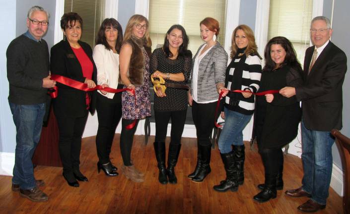 Photo by Roger Gavan On Dec. 4, Mayor Michael Newhard and members of the Warwick Valley Chamber of Commerce joined owner Laura Mignone and members of her team for a ribbon-cutting ceremony to celebrate the recent expansion and second anniversary of Capelli Salon and Spa Boutique. From left: Mayor Newhard; Sherry Bukovcan, president of the Warwick Valley Chamber of Commerce; Ann Marie Carpiniello salon coordinator; Allison Clark stylist/colorist; owner Laura Mignone, salon stylist/colorist; Kate McBride, stylist/colorist; Sylvia Cappelli, makeup artist; Melissa Conklin, esthetician; and Chamber Executive Director Michael Johndrow. Not present for the photo: Serena Mignone, assistant and Mary Elizabeth, massage therapist.
