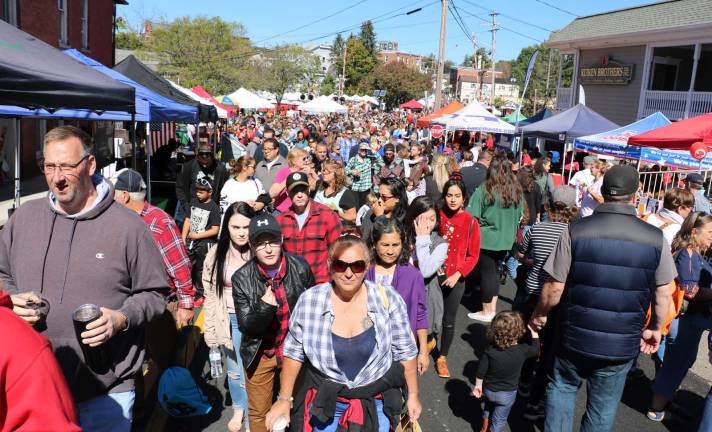 Photos by Roger Gavan South Street: The picture-perfect weather and mild temperatures may have caused everyone who always thought about attending that this was the day.