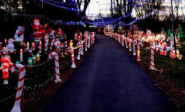 Visiting Spanktown Road to enjoy his spectacular display has become a Christmastime tradition in the Town of Warwick. The lights are turned on at 4 p.m.