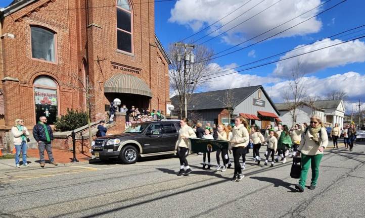 Members of the Sheahan-Gormley School of Irish Dance stepped and marched without losing a beat.