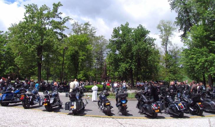 The bikers paused for a general blessing by Fr. Miccula before the 40 mile ride.