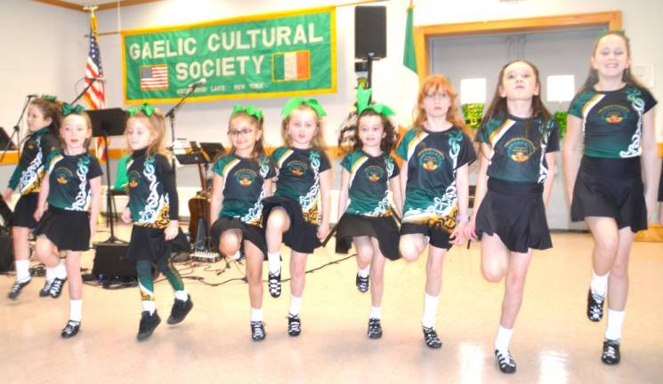 Children of varying ages from the Sheahan-Gormley School of Irish Dance perform at the event.