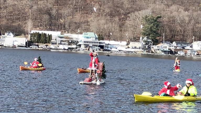 Costumed paddle boarders spent 1 1/2 hours on the water during the ninth annual Santapalooza.