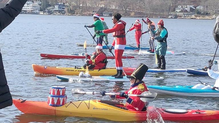 Close to 50 people took part in the ninth annual Santapalooza, sponsored by Jersey Paddle Boards, a canoe and kayak rental service on Greenwood Lake.
