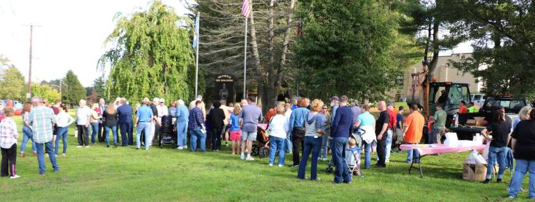 On Saturday, October 14, approximately 150 people gathered in Veterans Memorial Park to witness the burying of the Sesquicentennial Time Capsule next to the Firemen&#x2019;s Memorial, where the Centennial Capsule had been removed in August.