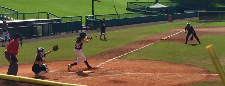Photos provided Goshen's Jenny Lawless, #15, had the game-winning hit in the semi-final game of the U16 World Series Tournament.