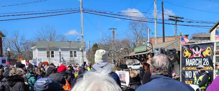 Maria Christina Martinez, an immigrant rights consultant shares her story with the No Kings crowd.
