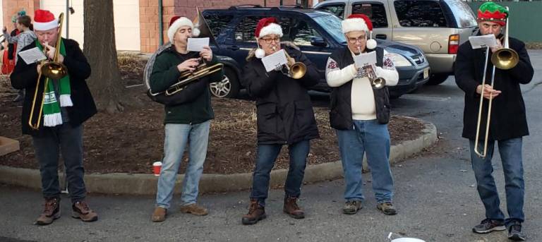 Tight. Cool. And more cool: The brass quintet of holiday sounds.