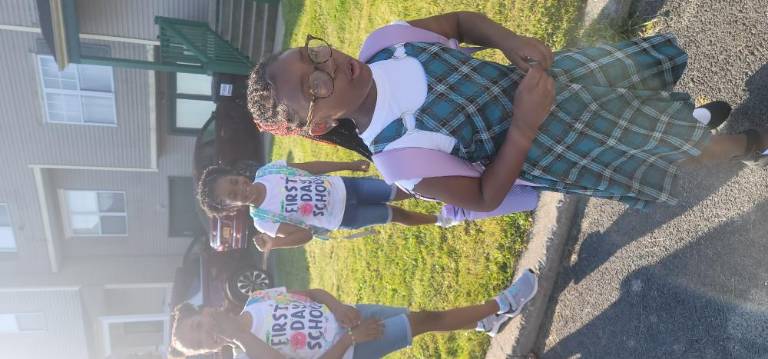 Rebecca, Hannah and Alexi heading off to a new school year.