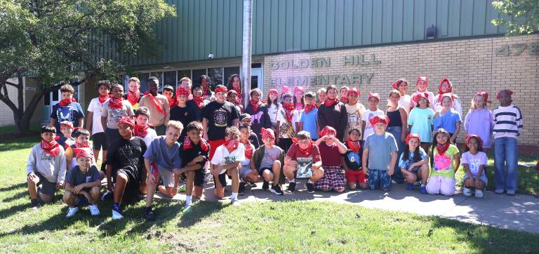 Students in the fifth grade at Golden Hill each received and wore their own red bandanas, in honor of Welles Crowther.