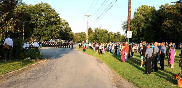 Photos by Roger Gavan On September 11, at 6 p.m. Chief Jason Brasier of the Warwick Fire Department welcomed local residents, public officials, veterans and members of the Warwick Police, Ambulance Corps and Fire Departments, and others gathered in Veterans Memorial Park. They were there to honor the victims of that attack, especially those who lived in Warwick.