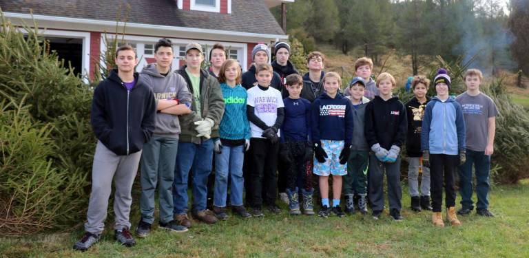Photo by Roger Gavan On Saturday, Dec. 1, members of the Warwick Valley Wrestling Junior Varsity and Modified programs sold Christmas Trees at Edward&#x2019;s Tree Farm off Amity Road. Senior Varsity wrestlers were on hand on Sunday, Dec. 2.