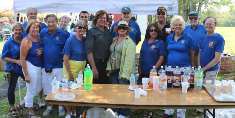 The Town of Warwick and the Warwick Valley Rotary, some of whose members are pictured here, hosted the annual senior barbecue at the Town&#x2019;s Union Corners Park.