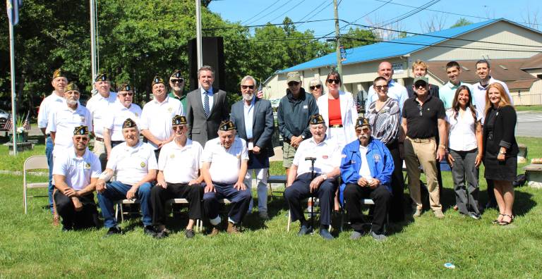 Local leaders, student researchers, veterans and residents gather at the site of Patriot’s Path in Warwick.