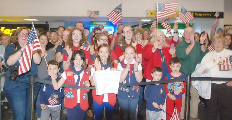 Crowds greeted the veterans at Stewart International Airport on Saturday upon their return on Honor Flight 24.