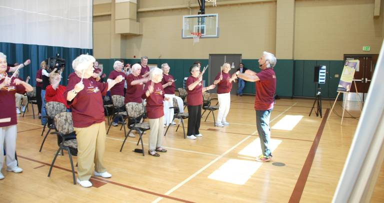 David Dworkin leads a Conductorcise class.
