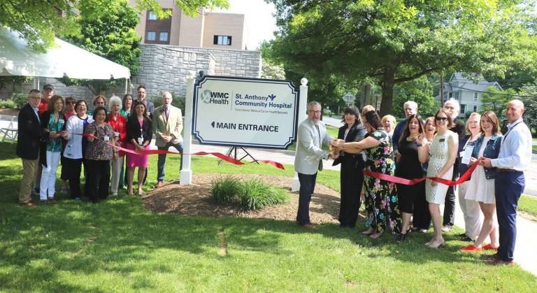 On Wednesday morning, May 30, local officials including Town of Warwick Supervisor Michael Sweeton and Mayor Michael Newhard, members of the Orange County Health Department and Warwick Valley Chamber of Commerce joined Dr. Mary Leahy, CEO of Bon Secours Charity Health System (cutting ribbon) and COO Patrick Schmincke, along with other system administrators and hospital staff to celebrate the kick-off of Warwick Walks with a ribbon-cutting ceremony.