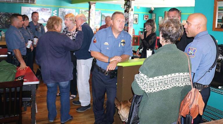 Photos by Roger Gavan On Wednesday morning, Oct. 4, members of the Warwick Police Department returned to the scene of their first &#x201c;Coffee with a Cop,&#x201d; event at the Tuscan Caf&#xe9; on South Street in the Village of Warwick.