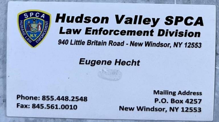 Eugene Hecht’s business card. He declined to say how he gets paid, how much, or whether his compensation is connected to the animals he seizes. IRS filings show he does not receive an on-the-books salary from the Hudson Valley SPCA.