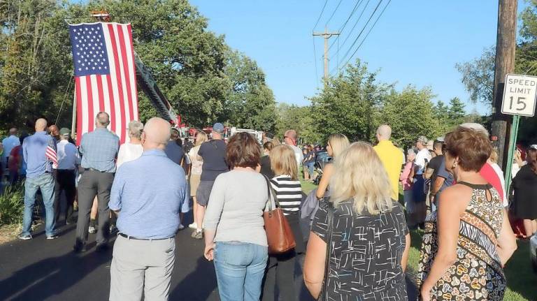 On Saturday, Sept. 11, local residents, public officials, veterans and members of the Warwick Police, Ambulance Corps and fire departments and many others gathered in Veterans Memorial Park.
