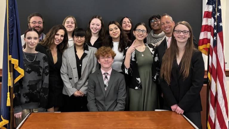 Seward's Mock Trial team. Standing back row, left to right: Adviser Dom Pascullo Jaycee Matuszewski, Virginia Clark, Jackie Tomassi and Tahnia-Marie Rucker; standing front row, from left: Kaci Werner, legal adviser Brittany Kessler, Lupita Velazquez-Trinidad, Amy Hernandez-Chinchilla, Autumn Montanez, legal adviser Richard Moran and Violet Collins; and sitting: Keegan McGoldrick. Photo provided by the Florida School District.