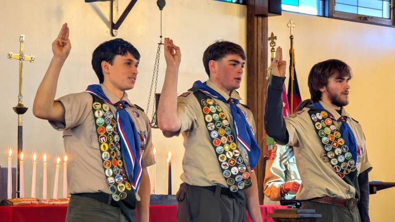 L-R: Eugene Cummings III, Kyle Bolich and Alexander Rodrigues receive prestigious rank of Eagle Scout.