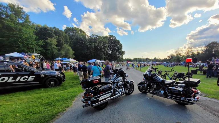 Community gathers at the 2025 National Night Out event in Warwick.