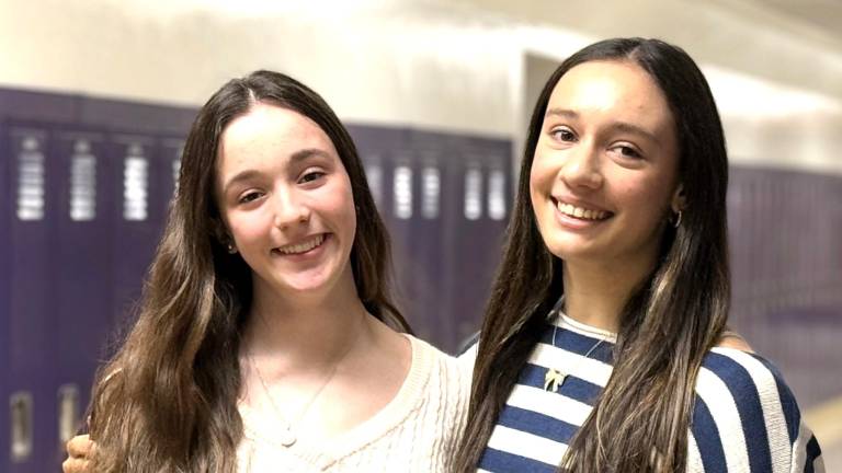 WVHS students Emma Giglio and Olivia Zottola balance school and extracurricular activities with a strong dedication to gymnastics.