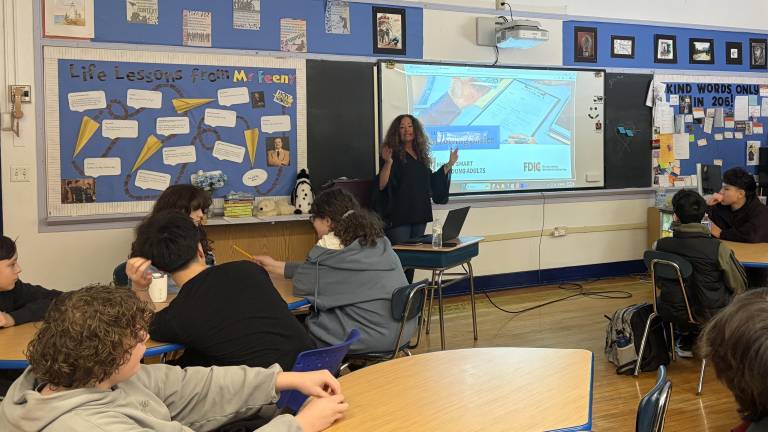 Chase Bank’s Niki Davola teaches financial literacy to Seward students.