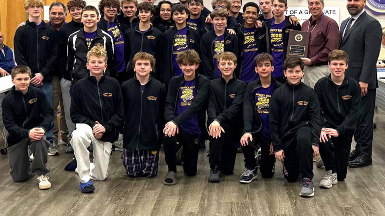 The Warwick Valley High School boys varsity swimming and diving team is honored by the BOE.