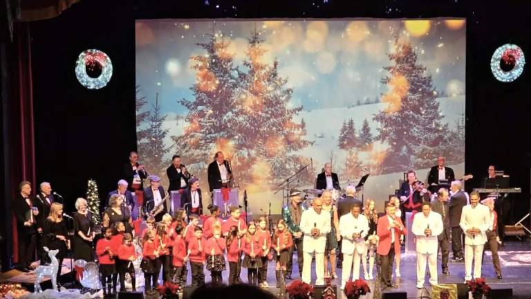 Students perform with music legend Jimmy Sturr