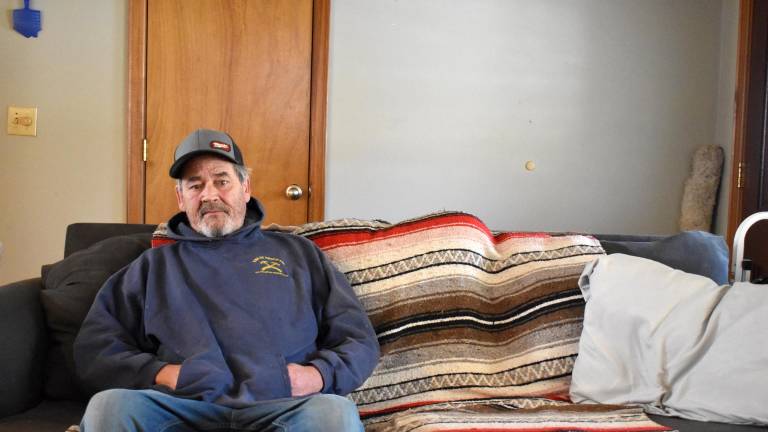 Timothy McCarty, 64, at home in Milford, Pa. the day before his bladder surgery — which was not covered by his insurance because it was across a state line in New York.