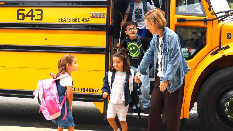 Students arrive at Golden Hill Elementary School.