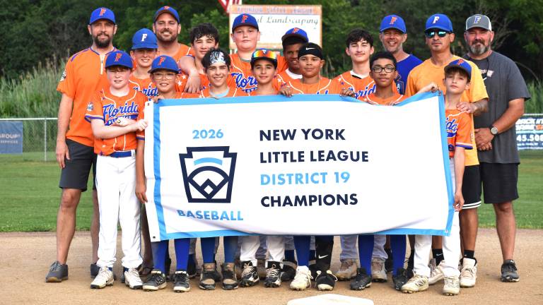 Florida Little League’s Major All-Star Team:Back row, left to right: Coach Josh Caldwell, Florida Little League President James McAteer, Manager Ray Younghans, Coach Justin Riordan and Coach Matt McKeonSecond row, left to right: Tom McKeon, Zach Younghans, RJ Kearns, Rocco Covelo and Gavin GuerraFirst row, left to right: Patrick Grogan, Sebastian Clark, Austin Caldwell, Colin Riordan, CJ Davila, Rylen Mejia and Joe Riordan