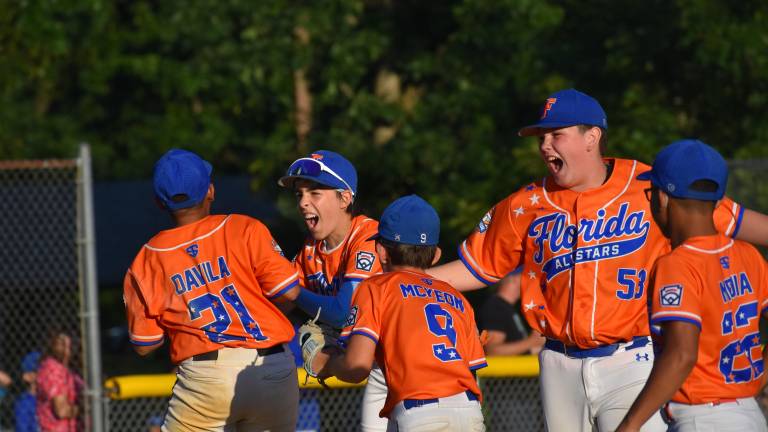 CJ Davila, Austin Caldwell, Tom McKeon, RJ Kearns and Rylan Mejia celebrate the NYS Section 3 title after beating Stony Point Monday, July 20 in Warwick.