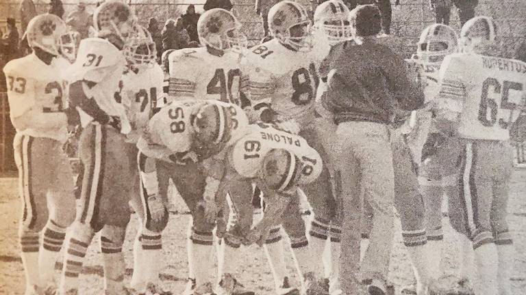Warwick’s 1984 championship football season documented by American filmmaker Matthew Miele. Members of the defense pictured include Bruce Miller (81), John Hegarty (31), Bryan Thibert (58), Jeff Cox (40) , Doug Rupertus (65), Mike Palone (61) and Patrick Rice (24).