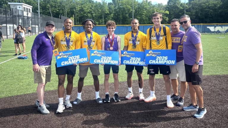 Warwick Valley Central School District boys track and field coach Mike Potter received the U.S. Track and Field and Cross Country Coach of the Year for New York State.