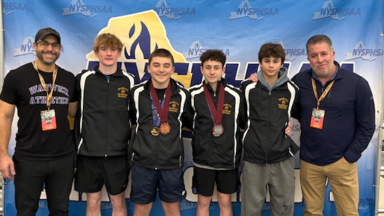 Coaches and members of the Warwick Diving Team at the NYSPHSAA championships.