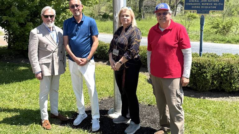L to R: Four officials and flag raising: Village of Warwick Mayor, Michael Newhard; Old Stone House Inn &amp; Restaurant owner, Arek Kwapinski; Eileen Sciscoe, member Greenwood Lake VFW and Honorary Graduate of West Point; Russ Kowal, Town of Warwick Councilman.