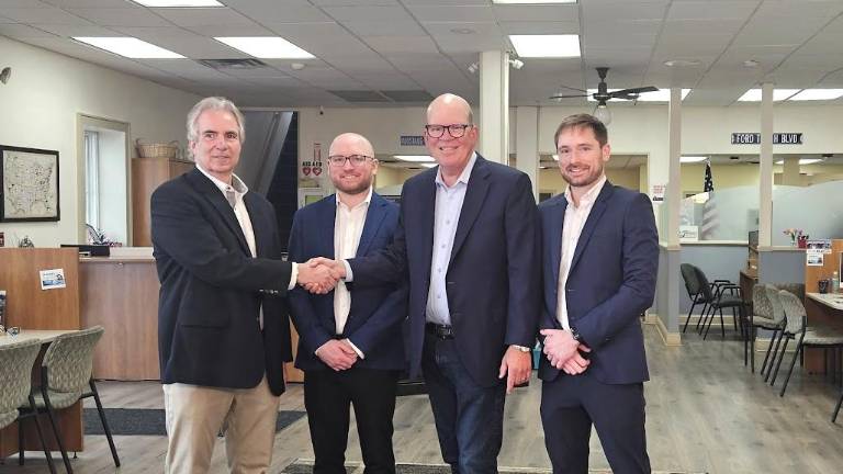 Leo Kaytes, Jr., welcomes the Fette family to Warwick. L-R: Leo Kaytes, Jr., Hart Fette, John Fette and Daniel Fette.