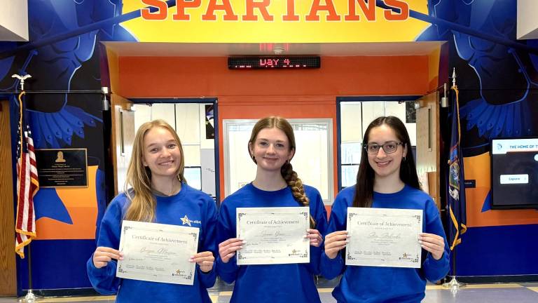 Left to Right: Georgia Maesano, Sierra Grove and Ava Andrade show off their certificates from the Touro College’s MedAchieve program.