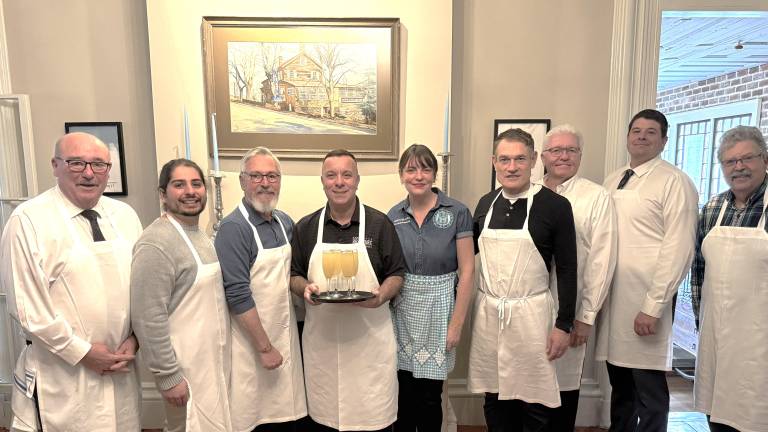 From left: Mayor Tom Howley, Anthony Jorge, Mayor Michael Newhard, Assemblyman Karl Brabenec; Trustee Mary Collural, Orange County Veterans Agency Christian Farrell, County Legislator Barry Cheney, Mayor Dan Harter, Jr., and Town Councilman Russ Kowal.
