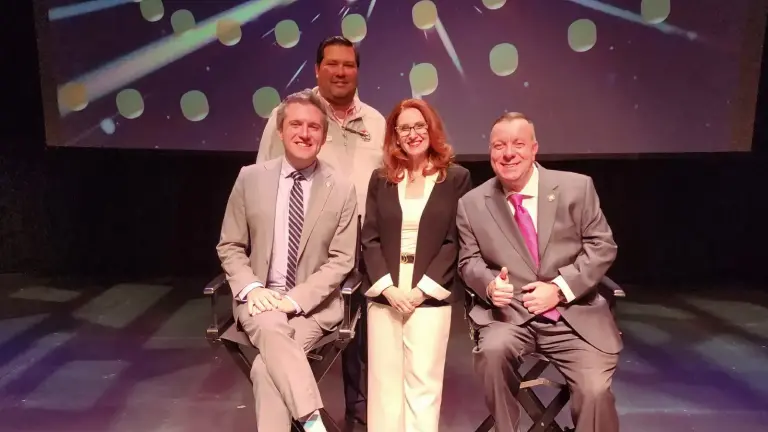 Orange County Chamber of Commerce President Heather Bell (center) with NYS Sen. James Skoufis (left) and NYS Assemblyman Karl Brabenec (right) and event moderator Daniel Ortega.