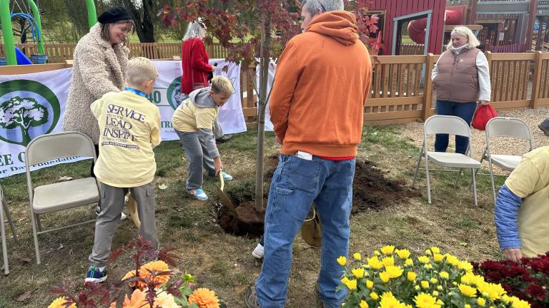 Participants at the 2024 Village of Warwick Arbor Day event at Stanley-Deming Park.