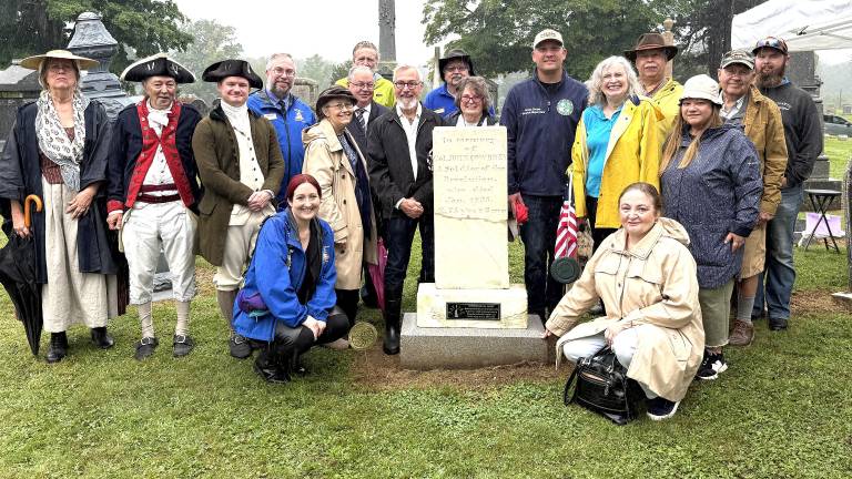 Commemorative plaque (close-up) and placement of the plaque by costumed Nicholas Fitzgerald from Boston Tea Party Ships Museum; and gathering of townspeople surrounding Thomas Cowdrey’s gravestone in the Warwick Cemetery on Colonial Avenue.